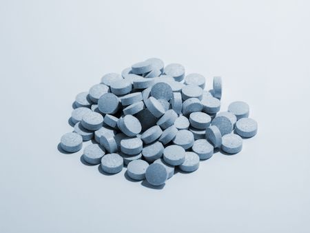 Lot's of pills isolated, a toned photoの写真素材