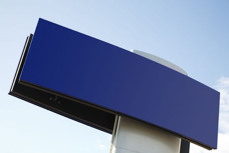 An empty billboard on a blue skyの写真素材