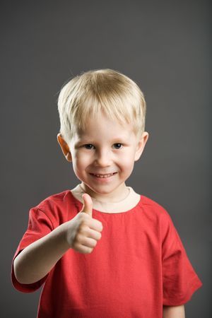 A photo of a boy with thumb up!