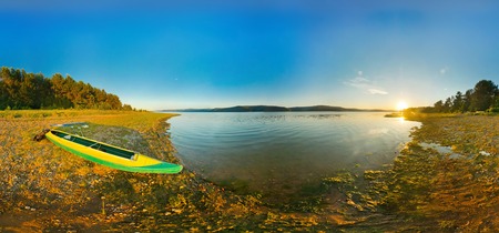 canoe on river coast. panorama,