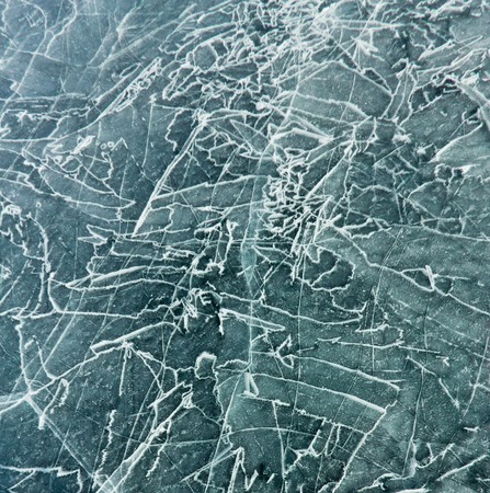 The pattern of cracks on blue ice of Lake Baikalの写真素材