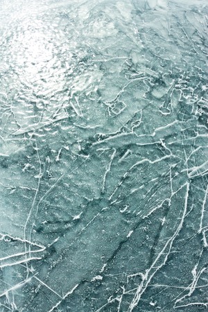 The pattern of cracks on blue ice of Lake Baikalの写真素材