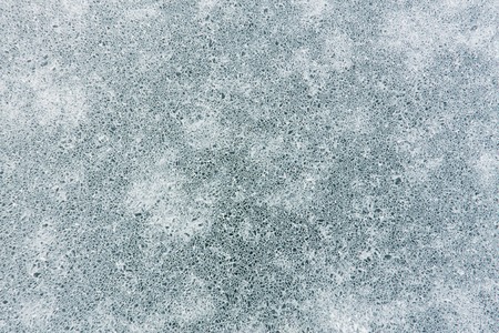 Net pattern of cracks on blue ice of Lake Baikal