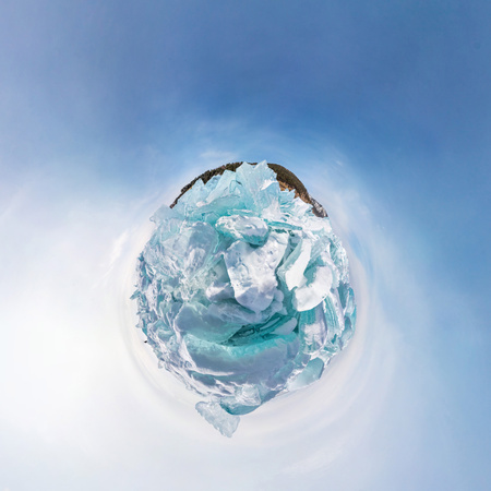 The blue hummocks of ice of lake baikal in the stereographic projection of little planetの写真素材
