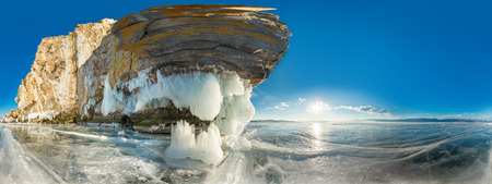 Cylindrical panorama 360 Rock on Olkhon Island on Lake Baikal ice covered.の写真素材