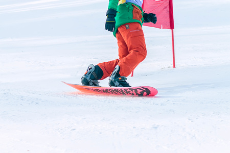 Irkutsk, Russia - February 12, 2017: Slalom competition snowboarding and skiing for adults and children in Irkutsk on the ski base in Akademgorodok Academy Cup in 2017のeditorial素材