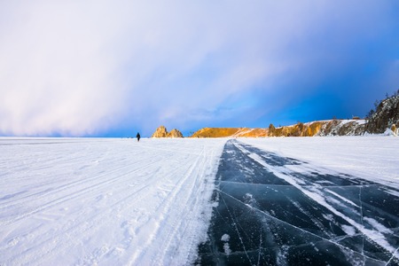 The road on the ice of Lake Baikal, to the Cape Shamanka, on the island of Olkhon.の写真素材