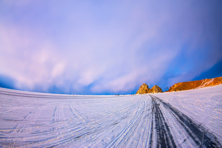 The road on the ice of Lake Baikal, to the Cape Shamanka, on the island of Olkhon.の写真素材