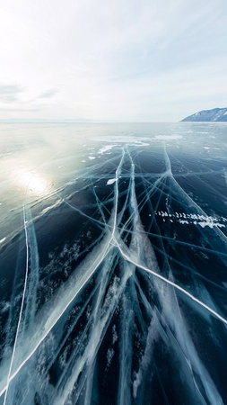 Panorama cracks on blue ice of Lake Baikal from Olkhon.の写真素材