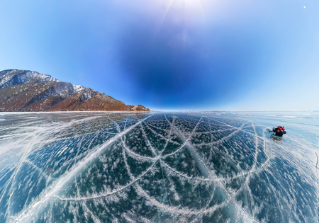 Patterns of cracks on a blue winter ice of Lake Baikal from Olkhon
