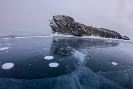 Air bubbles frozen in the ice near Oikoy Island of Lake Baikal