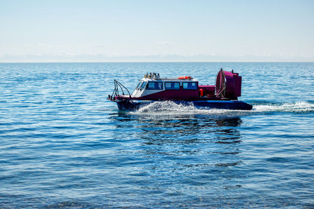 The hovercraft transports passengers by water in summer, water transport