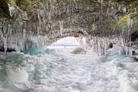 Ice cave grotto on Olkhon Island, Lake Baikal, covered with iciclesの写真素材