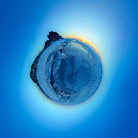 Big cracks in the ice of Lake Baikal at the Shaman Rock on Olkhon Island. Tiny little planet 360