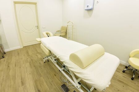 Interior of a massage room in a medical center or beauty spa salon.の写真素材