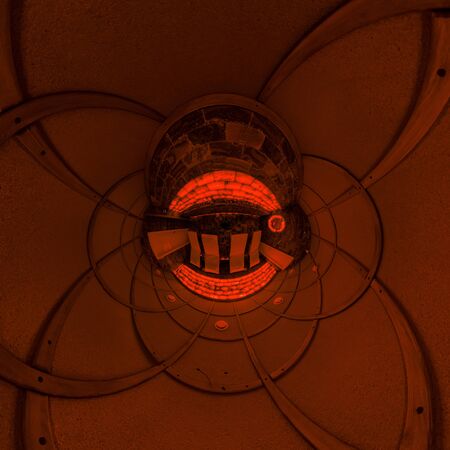 Interior relaxation salt room on dark orange illumination in medical spa salon. Tiny little planet...