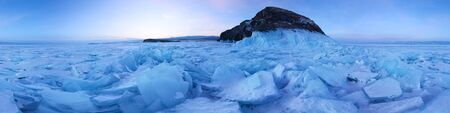 Ice hummocks field of Lake Baikal at the Shaman Rock on Olkhon Island. Cylindrical panorama 360.の写真素材