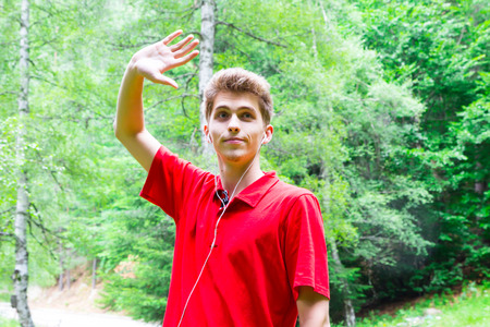 Young man showingの写真素材