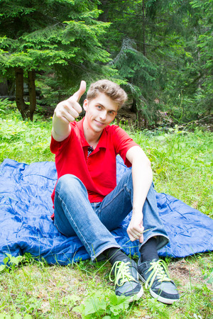 Young man showing Ok signの写真素材