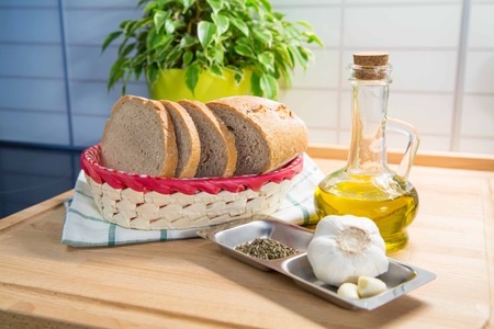 Garlic Bread Ingredients Olive Oil, Bread, Garlic, Spices on the tableの写真素材