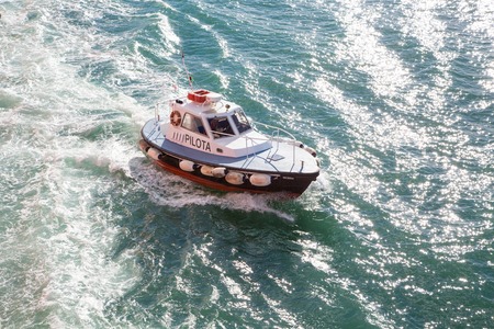 Ancona, Italy - November 7, 2014:  Pilot boat near the coast of Ancona, Italy following the ferryのeditorial素材