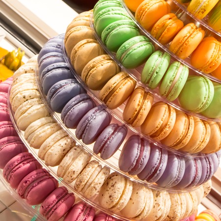 traditional french colorful macarons in a towerの写真素材