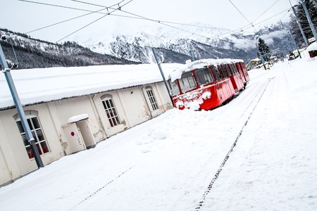 alpine red train Mer de Glace in snow at Chamonix, Fanceの写真素材