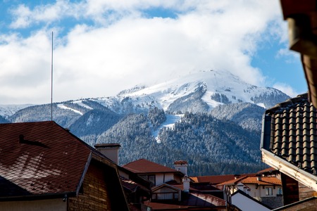 Winter view of the ski area in Bansko, Bulgaria  from the townの写真素材
