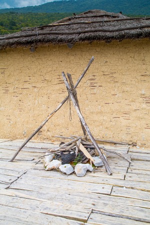 The ancient fireplace with the stones on the openairの写真素材