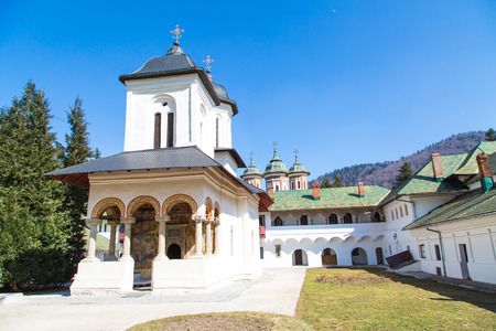 The old church at the Orthodox Sinaia Monastery and the partial view of the church inside, Romaniaの写真素材