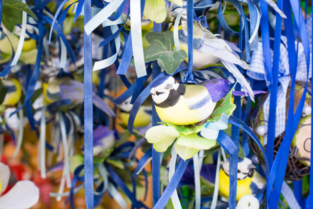 Nice Easter bird figurine in a marketの写真素材