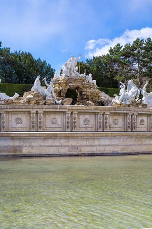 The Neptune Fountain at the Schonbrunn Palace Vienna Austriaの写真素材