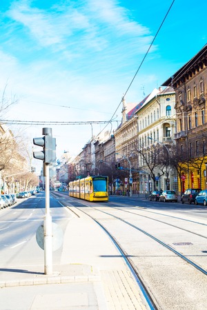 Budapest, Hungary - March 29, 2015:Yellow modern tram in Budapest, Hungary at one of the streetsのeditorial素材