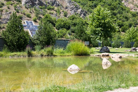 Christ and part of the lake at the territory of Baba Vanga complex, Rupite, Bulgariaの写真素材