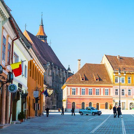 Brasov, Romania - March 24, 2015: Council Square - Piata Sfatului - and Black church in downtown of Brasov, Transylvania, Romania.のeditorial素材