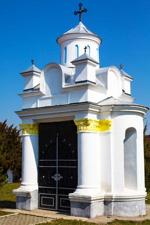 Small religious building at terriroty of Saint Nicholas Church in Brasov , Transilvania, Romaniaの写真素材