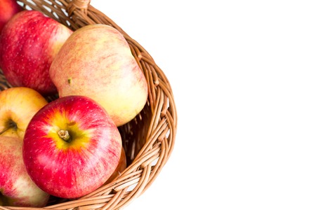 Autumn crop background with Ripe red Apples in the basket with copyspaceの写真素材