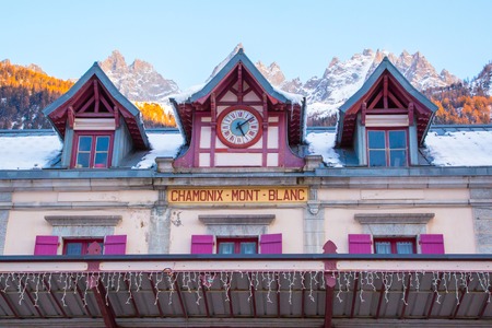 Chamonix, France - January  25, 2015: Facade of Chamonix train station near Mont Blanc, France, Frenck Alps and mountain peaks lightened with sun on the backgroundのeditorial素材