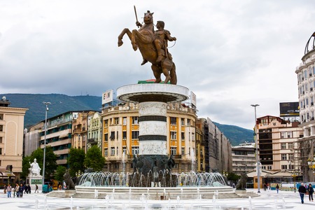 Skopje, Macedonia - September, 30, 2015: Statue of Alexander the Great on main square in downtown of Skopje, fountain and people walking aroundのeditorial素材
