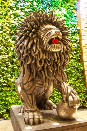 Macau, China - January, 10, 2014:  Lion statue near the entrance to City of dreams Casino, in Macau, Chinaのeditorial素材