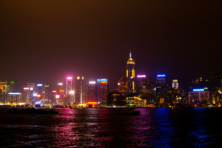 Hong Kong, China - January, 9, 2014: River and illuminated skyscrapers view at the night timeのeditorial素材