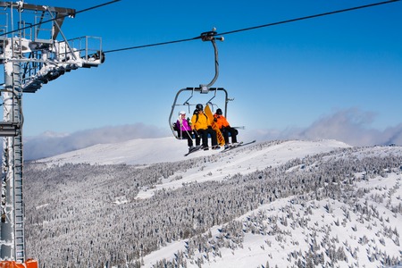 Kopaonik, Serbia - January 22, 2016: Skiers arriving to the station on the ski liftのeditorial素材