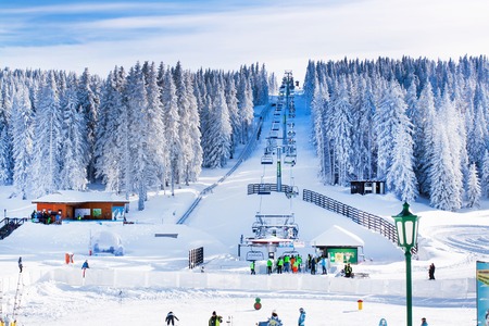 Kopaonik, Serbia - January 19, 2016: Panorama of ski resort Kopaonik, slope, people, skiers near ski lift, mountain view at winter timeのeditorial素材