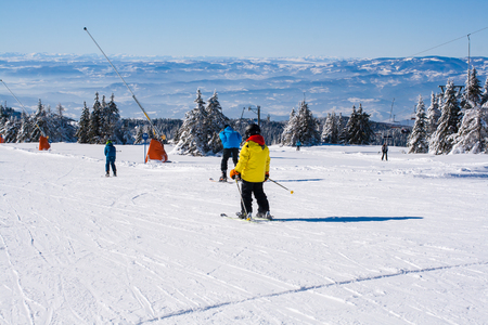 Kopaonik, Serbia - January 20, 2016: Ski resort Kopaonik, Serbia, ski slope, people skiing down the hill, mountains viewのeditorial素材