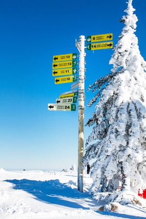 Kopaonik, Serbia - January 20, 2016: Ski resort, signpost giving directions to different ski slopes at alpine skiing areas in Kopaonik, Serbiaのeditorial素材
