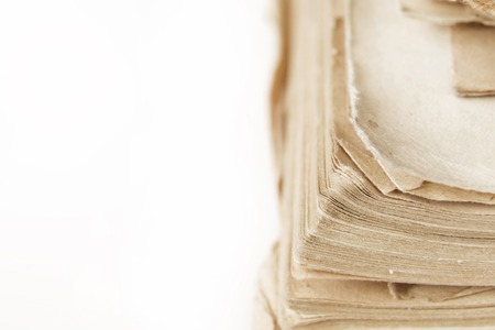 Closeup macro old book pages vintage texture on white background with copy space, place for textの写真素材