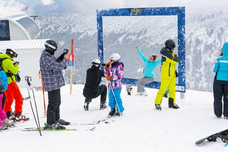 Bansko, Bulgaria - March 4, 2016: Ski resort, people taking photoes at upper station, Bansko, Bulgariaのeditorial素材