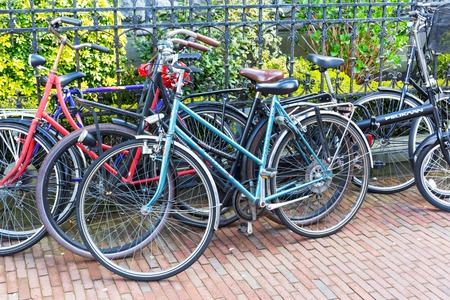 Leiden, Netherlands - April 7, 2016: Many bicyces parked in the street in Holland town Leiden, Netherlandsのeditorial素材