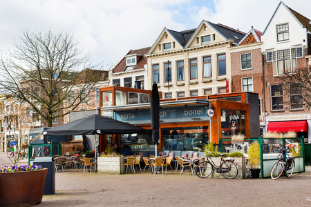 Leiden, Netherlands - April 7, 2016: Traditional houses, cafe and bicycles at the square in Leiden, Holland, Netherlandsのeditorial素材