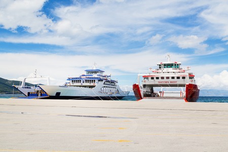 Thassos, Greece - May 3, 2016: Thassos port and ferry boats ready for loadingのeditorial素材